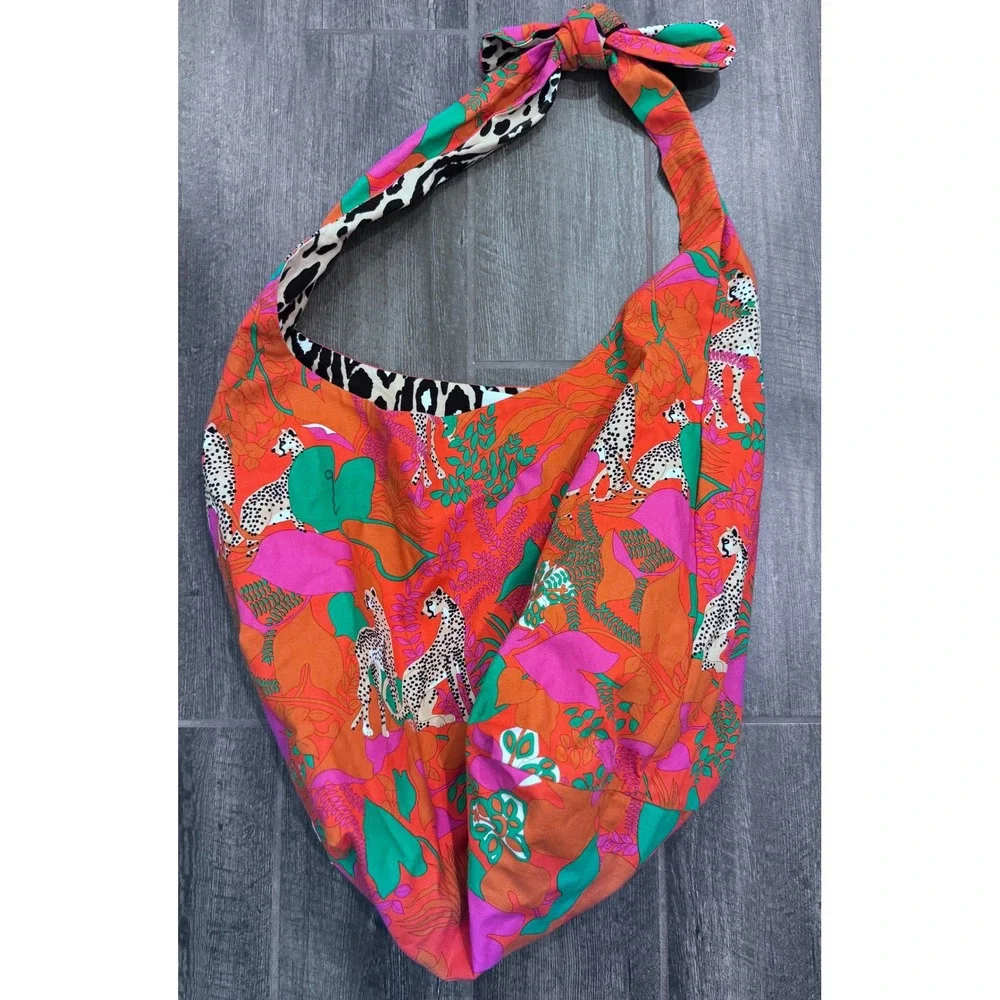 CAbi Sling‎ Bag  Reversible with Animal Print/Orange with Palm Leaf Print